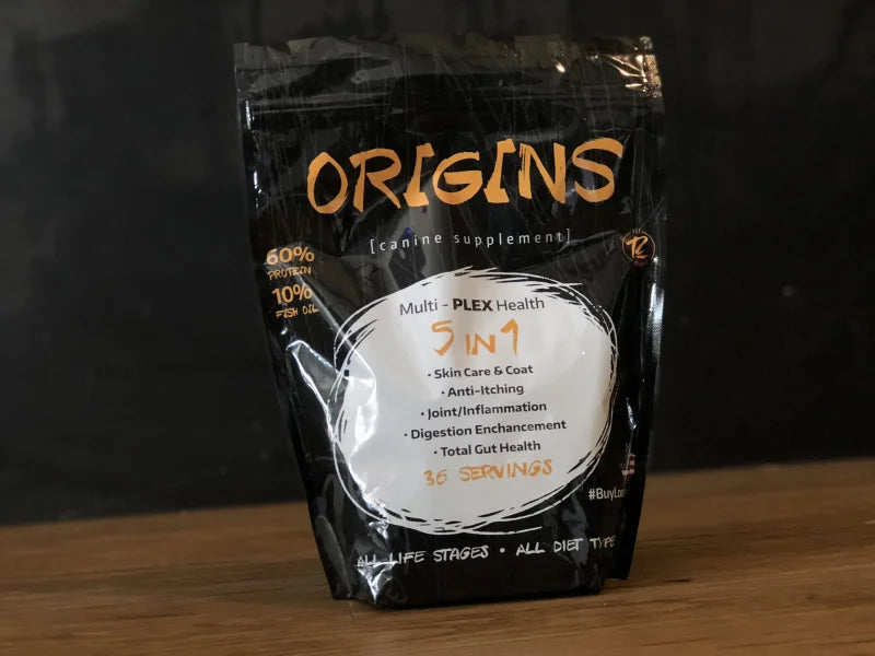 Black bag of Origins Canine Supplement from Rogue Pet Feed for dog health