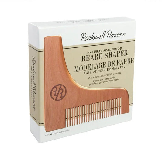 A Rockwell Razors Pear Wood Beard Shaper and comb set is shown in front of its white packaging with product details.