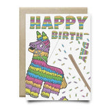 The Piñata Birthday Card by Anvil Cards features "Happy Birthday" in piñata-style letters with a colorful piñata, candy, and stick on a white background. A2 size, blank inside, includes a brown envelope.