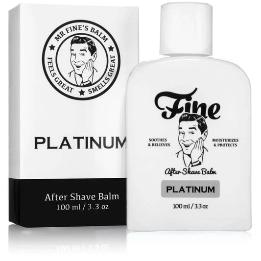A 100ml bottle and box of Platinum Aftershave Balm by Fine Accoutrements, an alcohol-free aftershave inspired by Creed Aventus, with a vintage-style smiling man and product info on the packaging.