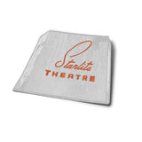 A Shop Sticker by Ballad of the Bird Dog features "Starlite Theatre" in orange on a gray textured background, referencing the Starlite Landmark, and is shown against a white backdrop.