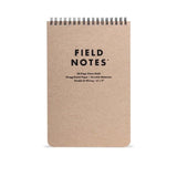 A brown spiral-bound Field Notes Steno Book by Field Notes, with black cover text and Gregg-ruled pages, shown on a white background.