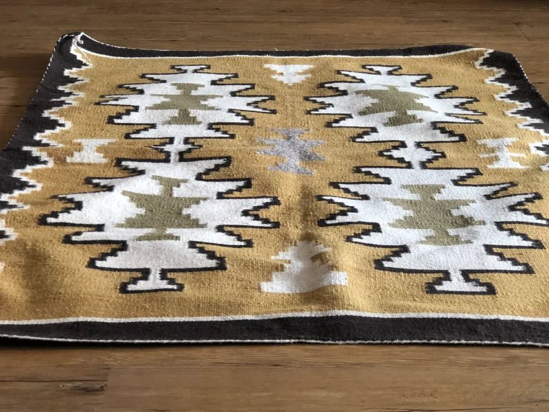 Geometric patterned rug from Two Grey Hills Vintage collection showcasing classic grey hills design